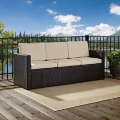 Palm Harbor Outdoor Wicker Sofa In Brown With Sand Cushions - Crosley -Garden & Outdoors GUEST 88c4f0eb 67e9 45d8 965a 78f4e075bc83